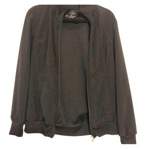 Infinity Cherokee light coat over scrubs